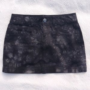 Black “tie-dye” denim skirt